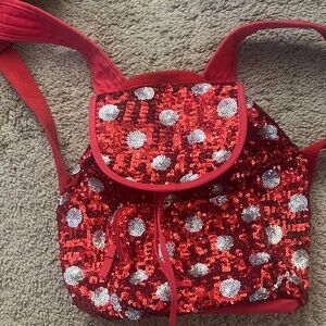 Red and silver backpack.